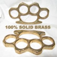 genuine solid brass nux paperweight